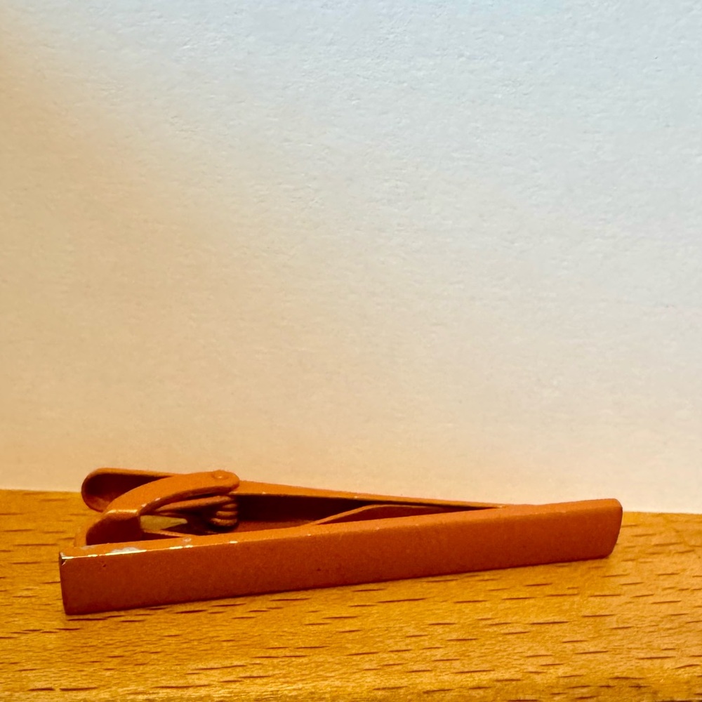 Burnt Orange Mens 2in Tie Bar. Used